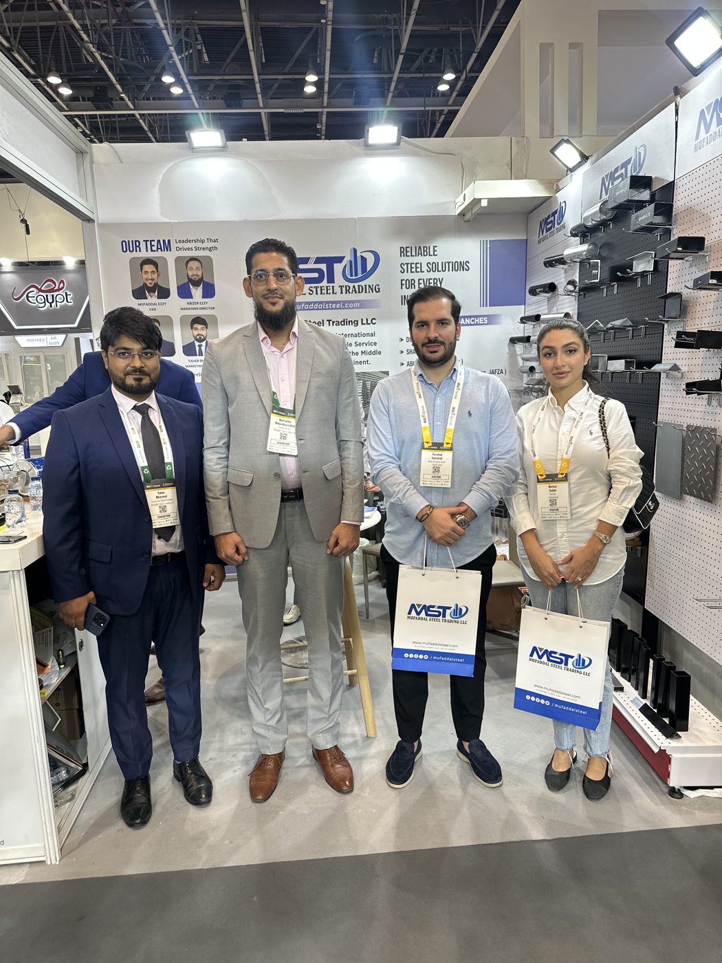 Mufaddal Steel Trading LLC team group photo at exhibition